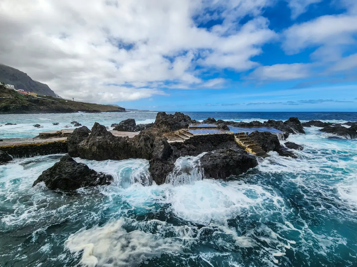 Atlantic waves around the volcanic natural pools of El Caletón in Garachico